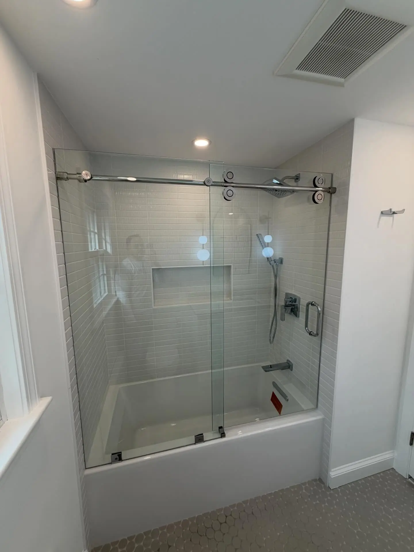 Tub-to-shower conversion by MTD Tile and Design